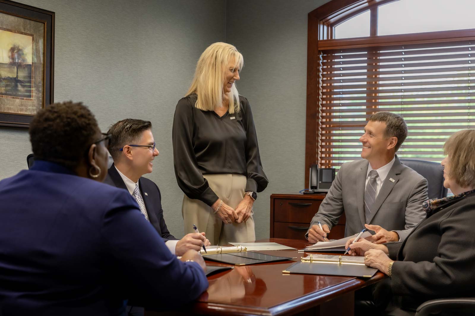 Touchmark National Bank business savings meeting